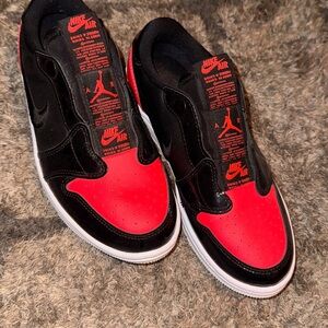 Nike Air Jordan 1 Black and Red Athletic Shoes